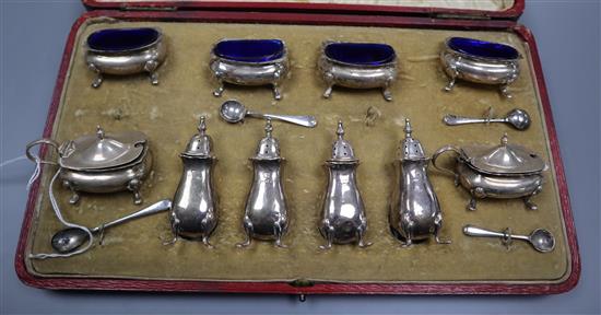 A cased matched early 20th century ten piece silver cruet set.